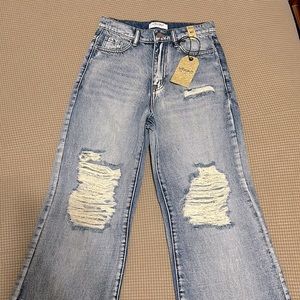 Vibrant bell bottom jeans from boutique. Size 1 fit like 00-0
